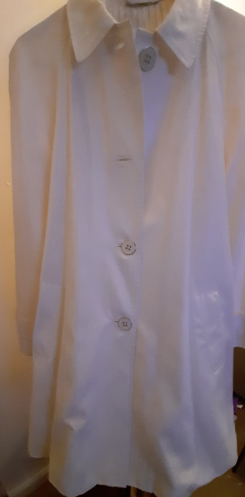 White swing trench coat